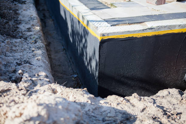 Professional Waterproofing technician working in Linwood, NJ